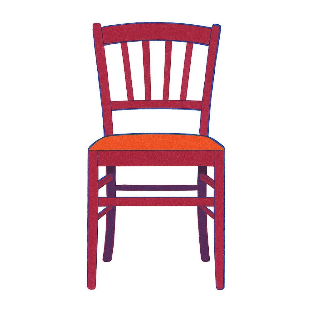 An empty dining chair.