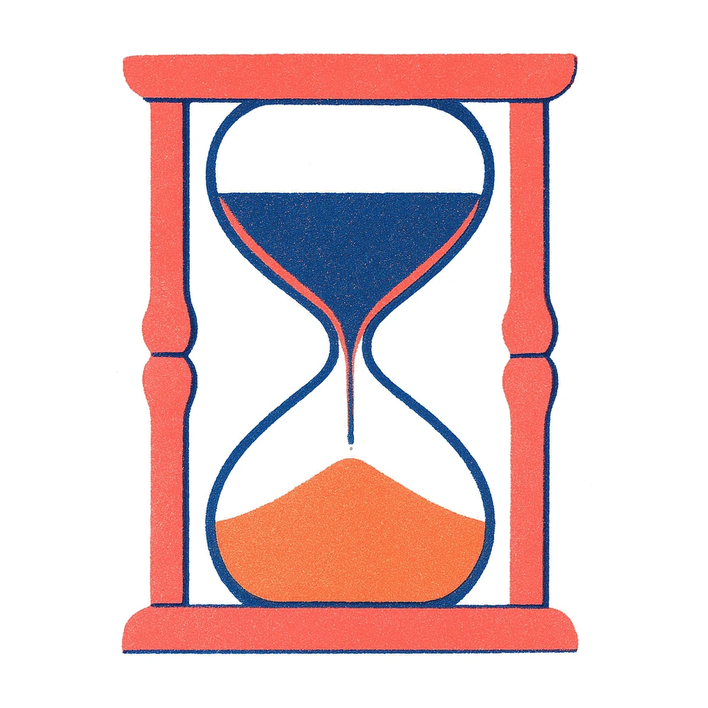 An hourglass with sand running through it.